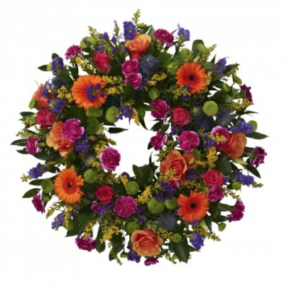 Vibrant loose wreath | Buttercups & Daisies Florist Birmingham - Vibrant loose wreath, handcrafted funeral flowers in Birmingham.