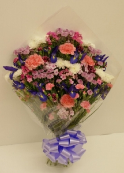 Funeral Flowers in Cellophane | Buttercups & Daisies Florist Birmingham - Cellophane Funeral Sheaf, handcrafted by our Birmingham florists.