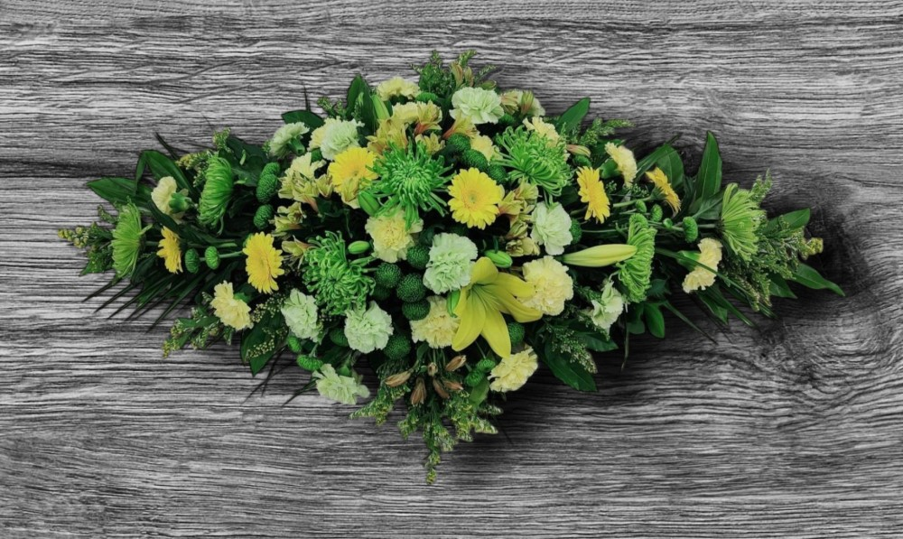 Yellow and Green coffin spray Product Image
