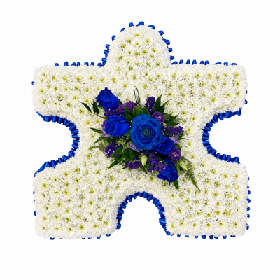 Jigsaw Puzzle Piece Tribute | Buttercups & Daisies Florist Birmingham - Blue and white jigsaw puzzle piece funeral tribute handmade in Birmingham.